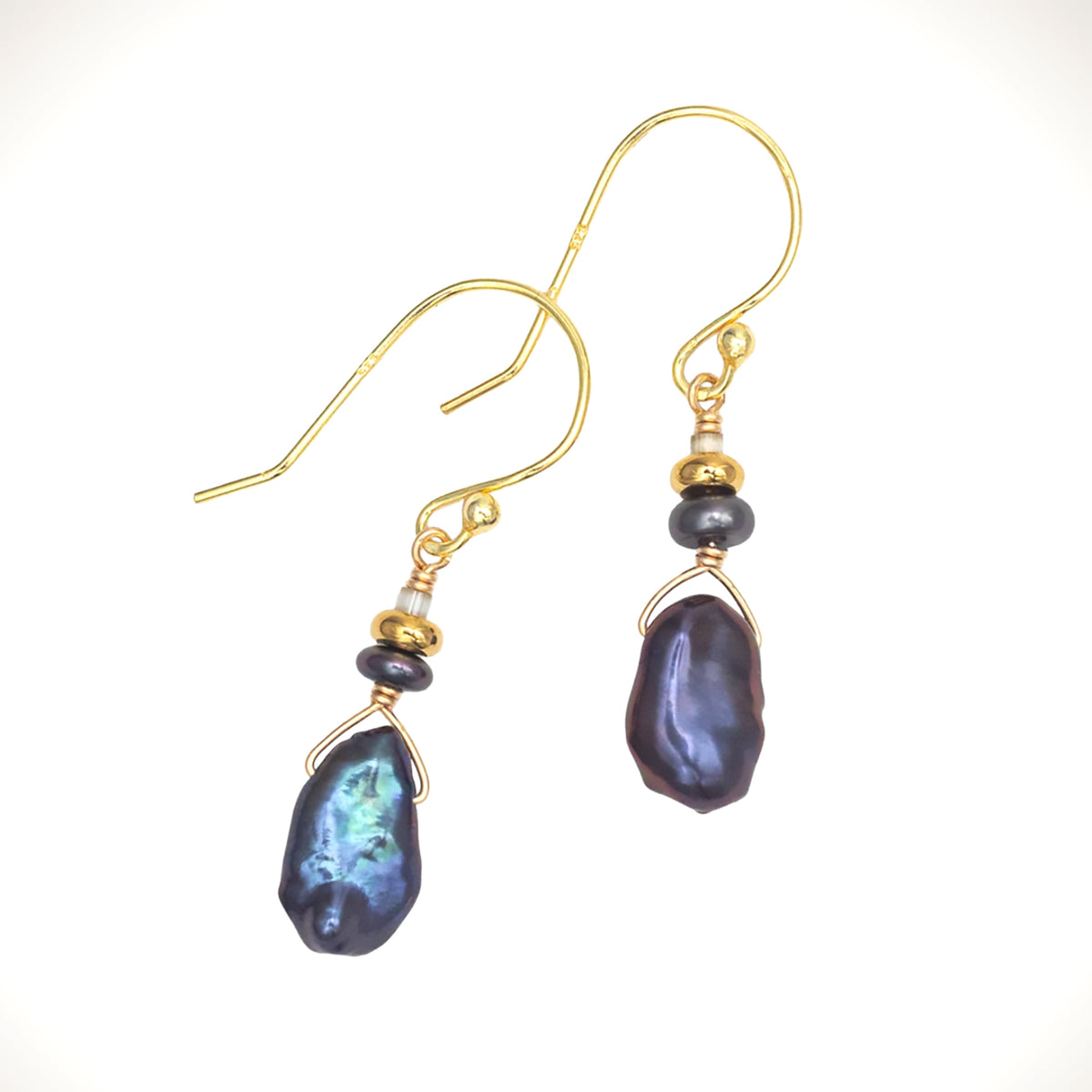 Holly Yashi Delicate Margo earrings with irregular peacock-colored pearl drops, small bead accents, and gold-colored French hook ear wires.