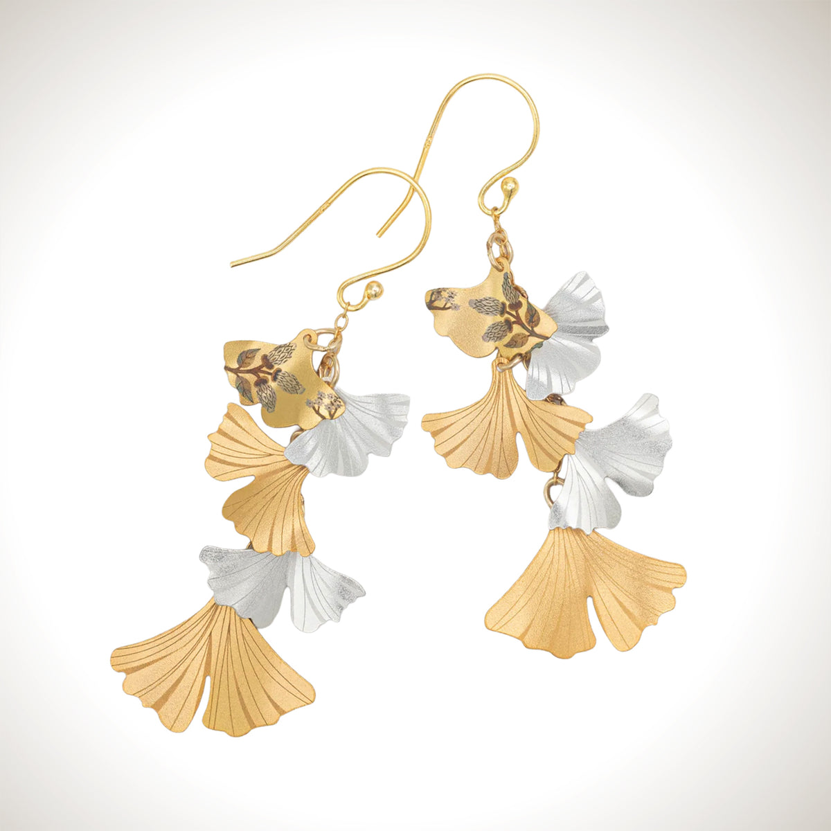 Holly Yashi Fluttery Gingko Drop earrings with cascading gold-plated and silver-plated fan-shaped leaves, fine vein details, and gold-colored French hook ear wires.
