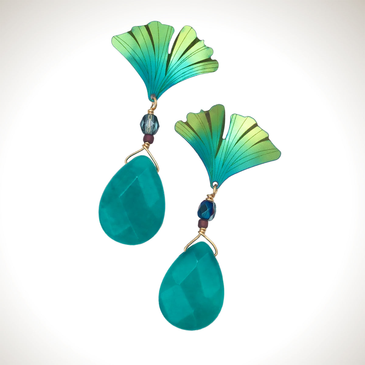 Holly Yashi Gingko Gem Drop earrings with teal and green fan-shaped niobium leaves, small bead accents, and faceted turquoise-colored amazonite drops.